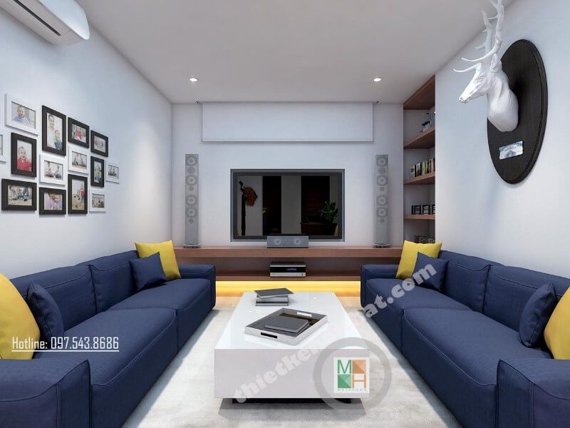 Trang trí nội thất phòng khách hiện đại với bộ sofa bọc vải màu xanh