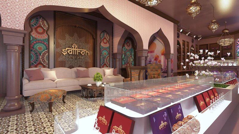 Trang trí showroom làm đẹp Saffron ấn tượng theo tông màu chủ đảo hồng và nâu tím kết hợp với bộ sofa bọc nỉ màu hồng tân cổ điển tạo nên một tổng thể hài hòa nhưng không kém phần ấn tượng
