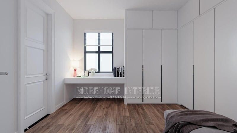 Mẫu tủ quần áo gỗ công nghiệp đẹp màu trắng với kích thước lớn ốp dọc mảng tường giúp tiết kiệm diện tích không gian căn phòng ngủ